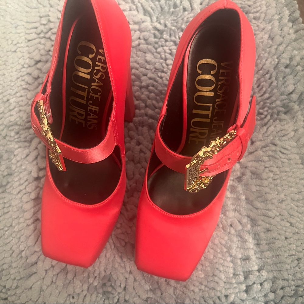 Size 7 Versace platform heels. Brand new never worn.